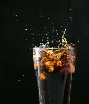 Cola splash Stock Photos