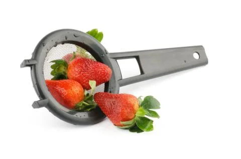 Colander with strawberry Stock Photos