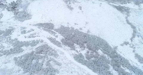A cold and lonely flight over a frozen, untouched landscape. A Frozen Untou.. Stock-Footage 314542745
