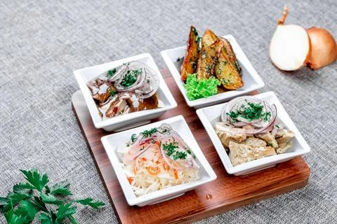 Cold appetizer - assorted mushrooms: salted mushrooms and salted buttermilk.  Stock Photos