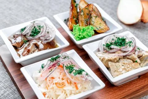 Cold appetizer - assorted mushrooms: salted mushrooms and salted buttermilk.  Stock Photos
