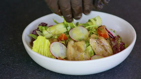Cold appetizer. Salad with vegetables and turkey or duck meat. Stock Footage 158781156