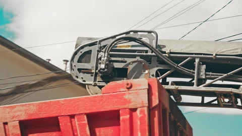 Cold Asphalt Road Milling Machine loading Asphalt into Truck. Asphalt Milling Stock Footage 242179864
