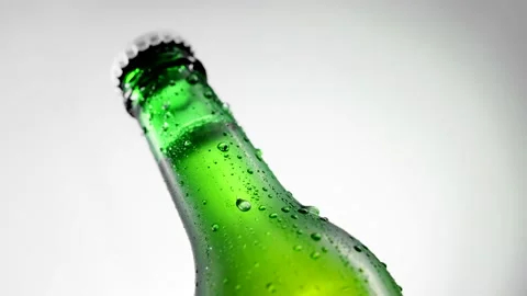 Cold beer bottle with drops rotates 360 degrees Stock Footage 151795131