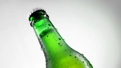 Cold beer bottle with drops rotates 360 degrees Stock Footage 152168020