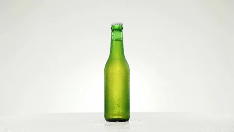 Cold beer bottle with drops rotates 360 degrees Stock Footage 152168103