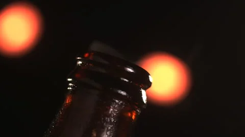 Cold beer bottle opened Stockbeeldmateriaal 242217038