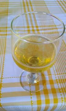 Cold beer cup on the table with yellow background Stock Photos
