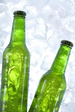 Cold beer in ice Stock Photos