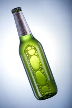 Cold beer in ice Stock Photos