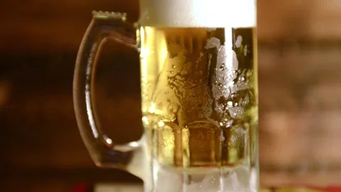 Cold beer mug light illuminating a golden glow 動画素材 145046423