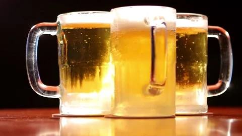 Cold beer mugs Stock Footage 130453254