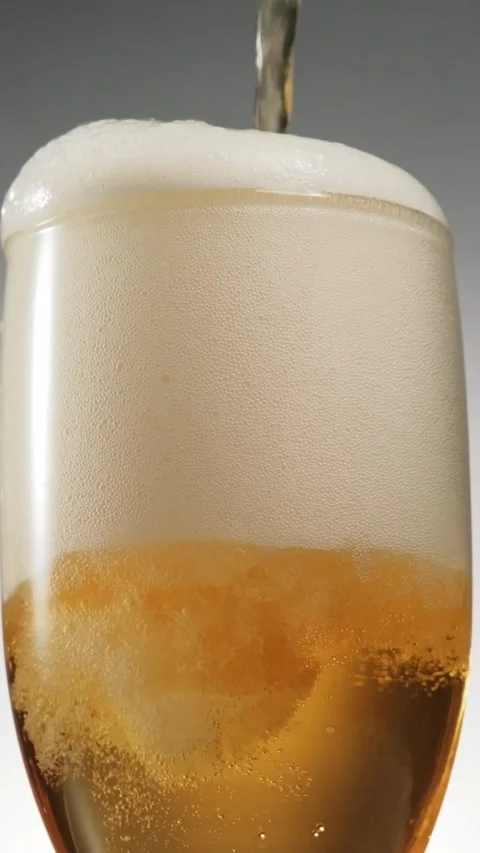 Cold beer pouring scene close up Stock Footage 321582842