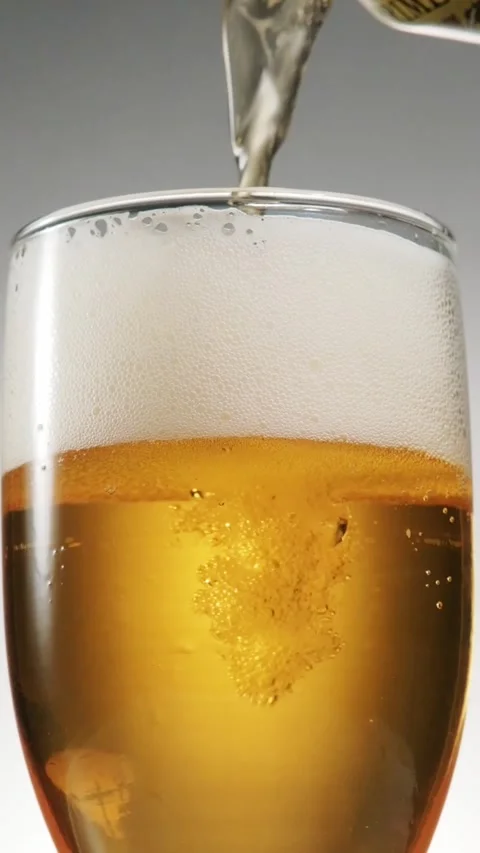 Cold beer pouring scene close up Stock Footage 321582855