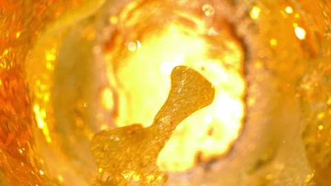 Cold Beer Splashing inside Glass High Speed Shot on Phantom Camera Slow Motion Stock Footage 100668883