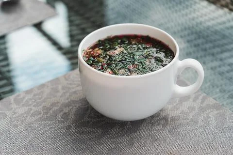 Cold beetroot soup, kholodnik, cold borscht, summer soup made of beets, herbs Stock Photos