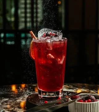 Cold berries cocktail on the table Stock Photos
