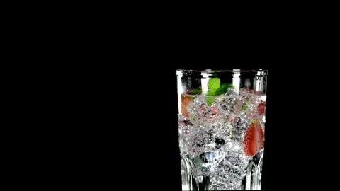 Cold beverage with Strawberry and mint on a black background Stock Footage 91892799