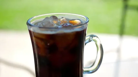 Cold brew coffee and ice cubes - close up shot Stock Footage 151995276