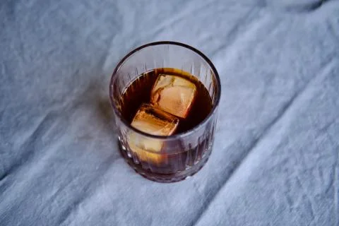 Cold brew coffee with two ice cubes, concept for cold coffee Stock Photos