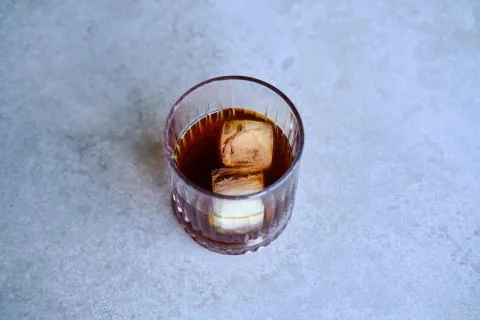 Cold brew coffee with two ice cubes, concept for cold coffee Stock Photos