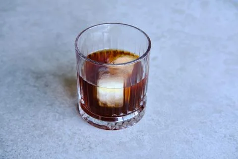 Cold brew coffee with two ice cubes, concept for cold coffee Stock Photos