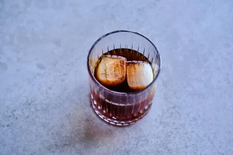 Cold brew coffee with two ice cubes, concept for cold coffee Stock Photos