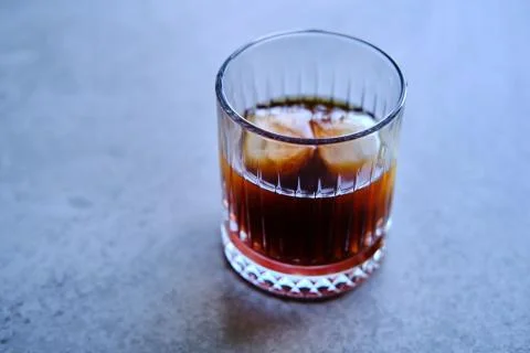 Cold brew coffee with two ice cubes, concept for cold coffee Stock Photos