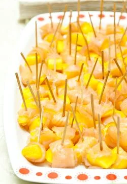 Cold buffet with mango and salmon Stock Photos