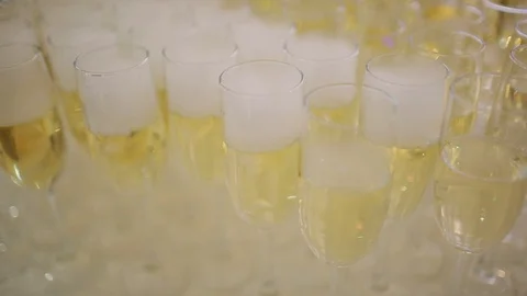 Cold champagne on the buffet table, people drink and eat Stock Footage 122060063