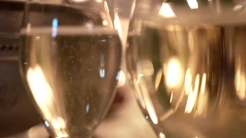 Cold champagne in long glasses on dinner table at romantic date in fancy bistro Stockbeeldmateriaal 117377547