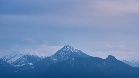 Cold cloudy april landscape with mountains, melting snow in the mountains, Stock Footage 167836694