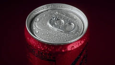 Cold Coca Cola drink on a red background, close up, isolated. 03.20.2024 One of Video stock 270997722