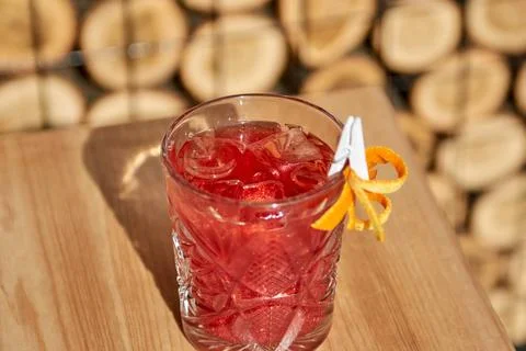 Cold coctails with lime, mint and ice in a glass with drops. Alcohol drink at Stock Photos