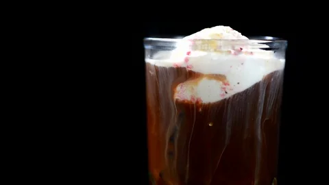 Cold coffee with ice cream Stock Footage 91916608