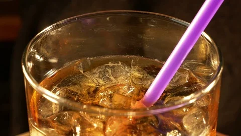 Cold cola with ice cubes in 4K Stock Footage 79483905