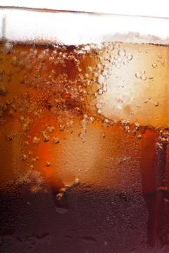 Cold cola with ice Stock Photos