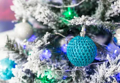 Cold colored christmas tree with lights. close up Stock Photos