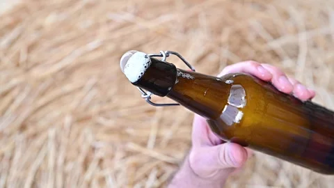Cold Craft light Beer in the bottle with water drops. Stock Footage 157154491