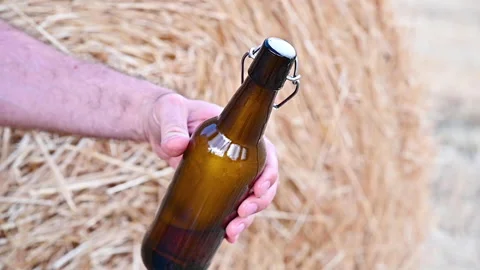 Cold Craft light Beer in the bottle with water drops. Video stock 164302846