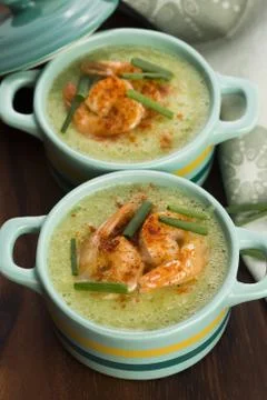 Cold cucumber soup with herbs and shrimps Stock Photos