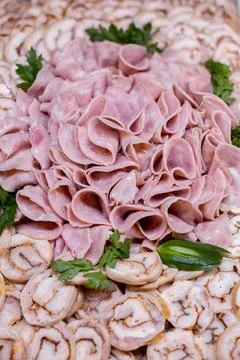 Cold cuts on a platter close-up Stock Photos