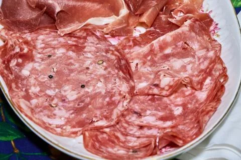 Cold cuts served on a dish Stock Photos
