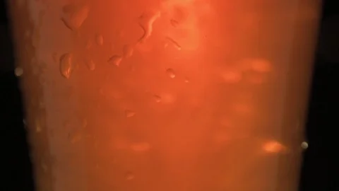 Cold dark beer in a glass with drops of water. Stock Footage 90487360