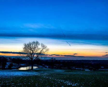 Cold dark sunset Stock Photos