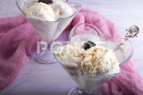 Cold dessert with milky-berry taste of mulberry. Stock Photos
