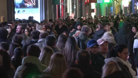 The cold does not deter the queues to buy lottery at Doña Manolita, Madrid, ES - Stock Footage 324594233
