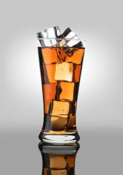 Cold Drink Cola Soda Soft Drink in a Glass with Ice Cubes Stock Photos