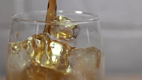 Cold drink video: cola pour in glass Stock Footage 245556903