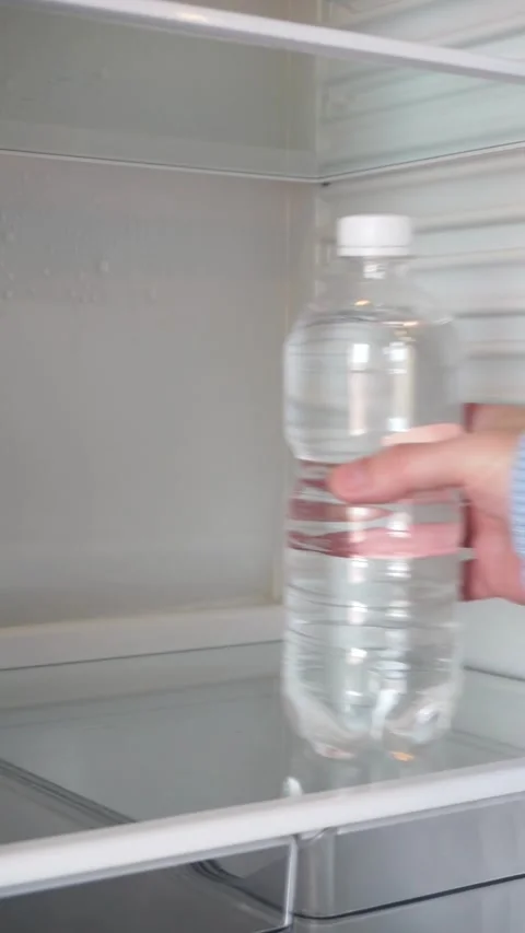 Cold drinking water in the refrigerator Stock-Footage 281940118